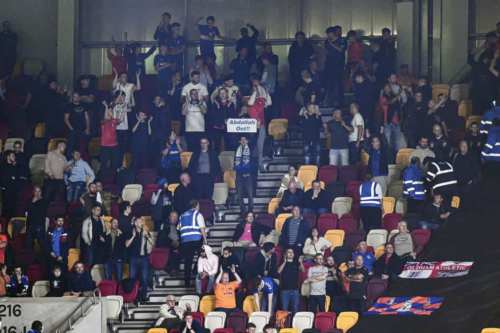 Oldham supporters in the stand protested against owner Abdallah Lemsagam in September (Ashley Western/PA)