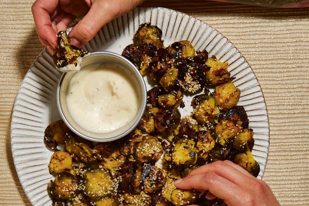 Smashed Brussels sprouts from Celebrate: Plant-Based Recipes For Every Occasion by Bettina Campolucci Bordi (Louise Hagger/PA)