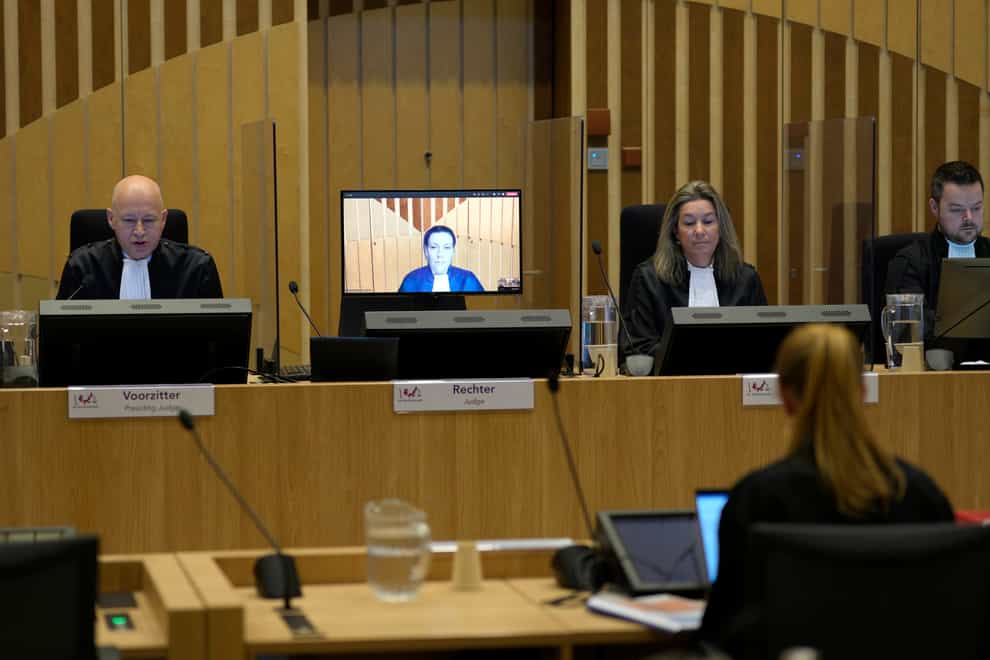 Presiding judge Hendrik Steenhuis, left, during the trial over the downing of Malaysia Airlines flight MH17 (Peter Dejong/AP)