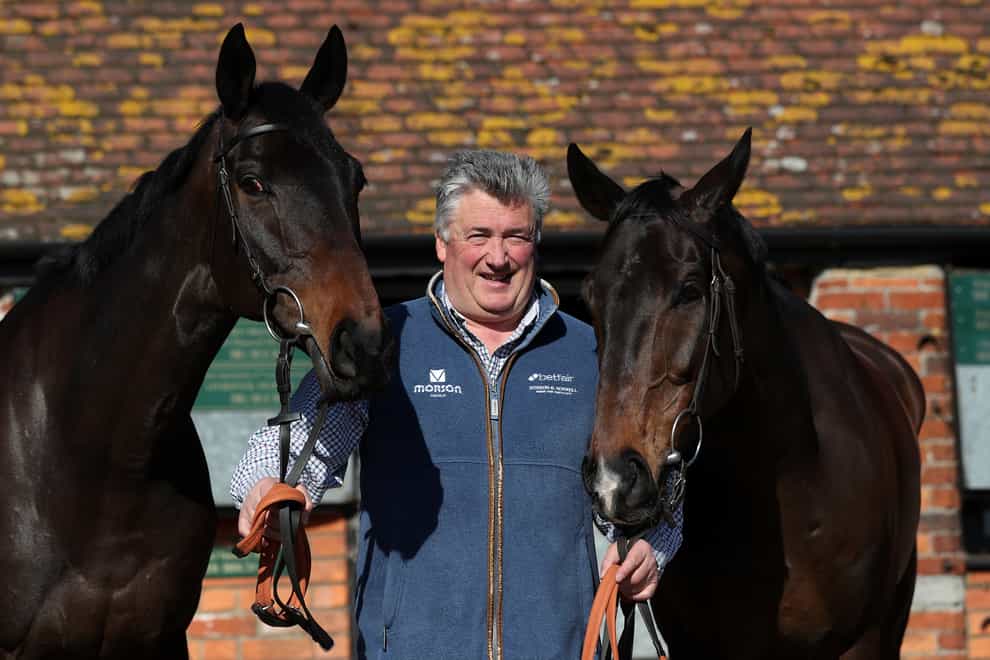 Paul Nicholls with Clan Des Obeaux (left) and Frodon (David Davies/PA)