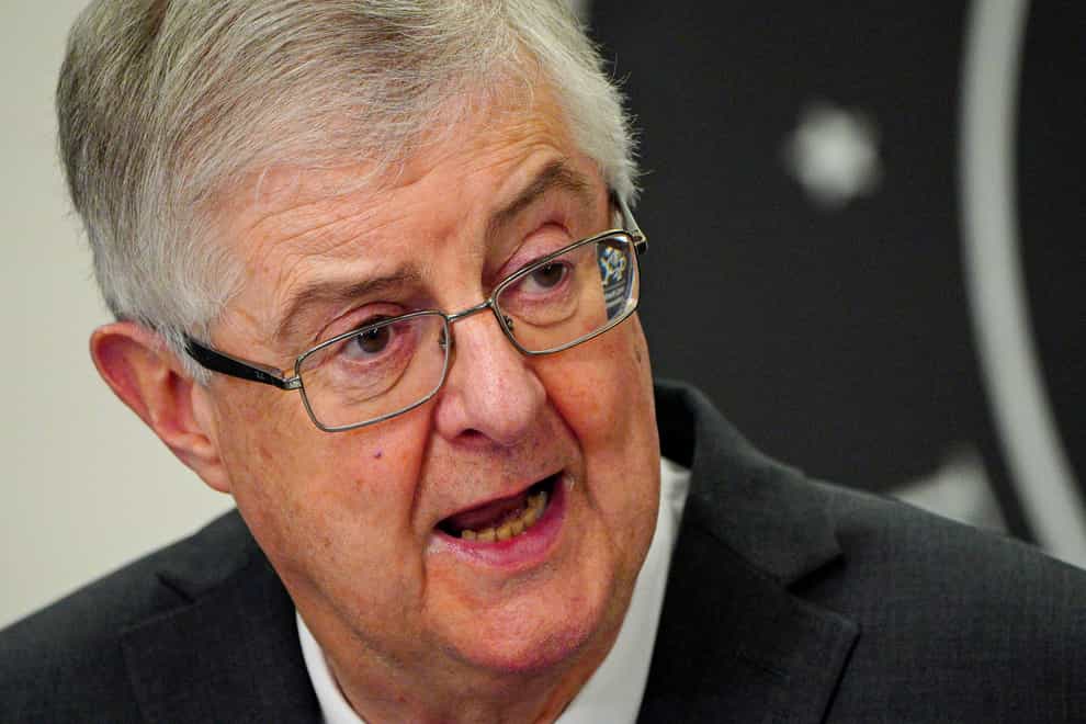 First Minister Mark Drakeford has dismissed fears over staff in Wales being fined for going into the office (PA)