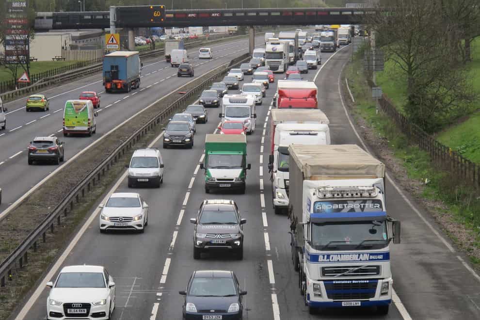 Motorways brought to a standstill and cancelled trains marred the first Christmas getaway in two years (Matthew Cooper/PA)
