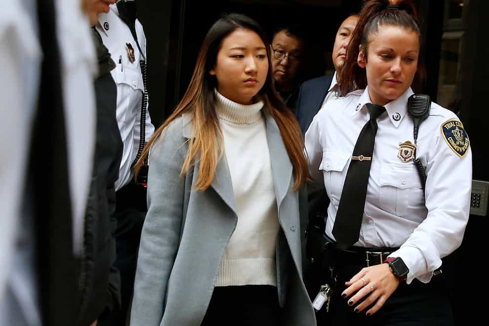 Inyoung You leaving Suffolk Superior Court in Boston in 2019 (Michael Dwyer/AP)