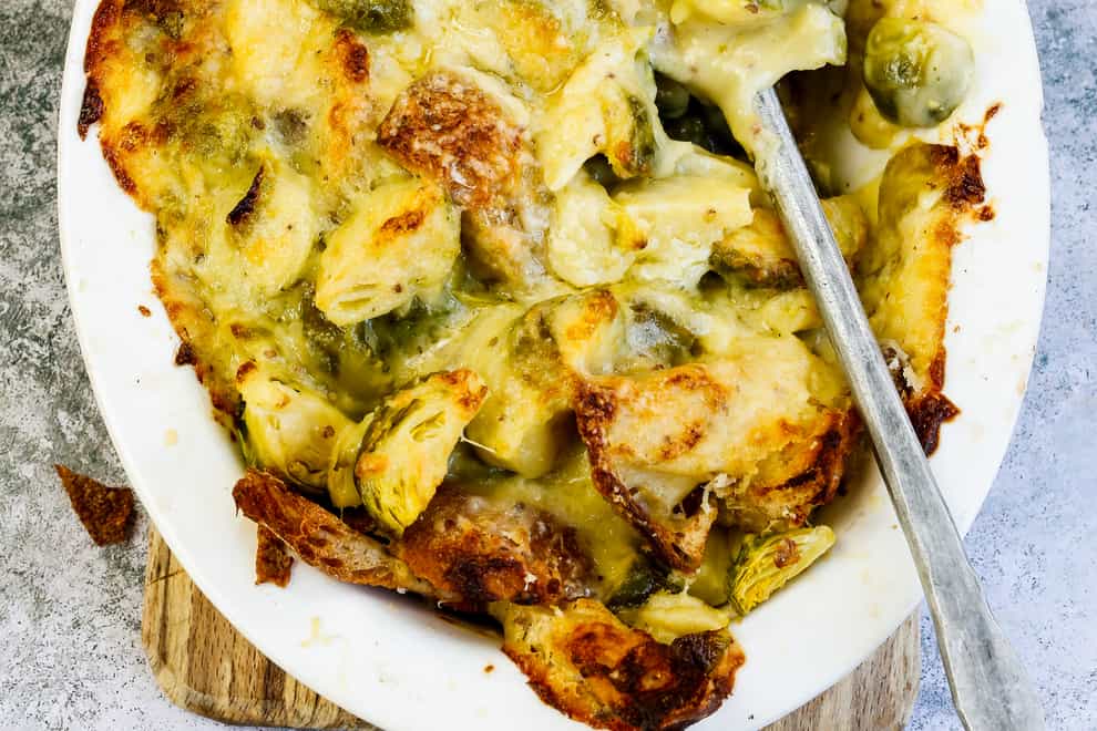 Savoury bread pudding with cheesy sprouts from The Complete Vegetable Cookbook: A Seasonal, Zero-waste Guide to Cooking with Vegetables by James Strawbridge (DK/PA)