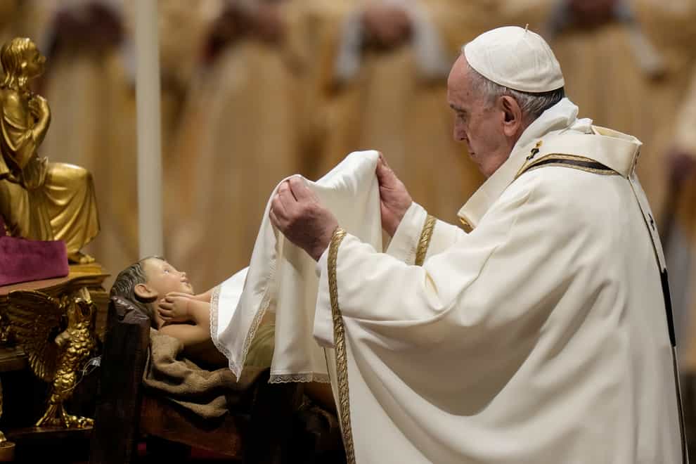 Pope Francis unveils a statue of Baby Jesus (Alessandro Tarantino/AP)