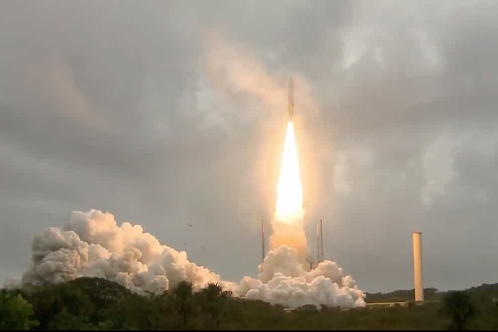In this image released by NASA, Arianespace’s Ariane 5 rocket with NASA’s James Webb Space Telescope onboard, lifts off Saturday, Dec. 25, 2021, at Europe’s Spaceport, the Guiana Space Center in Kourou, French Guiana. The $10 billion infrared observatory is intended as the successor to the aging Hubble Space Telescope. (NASA via AP)