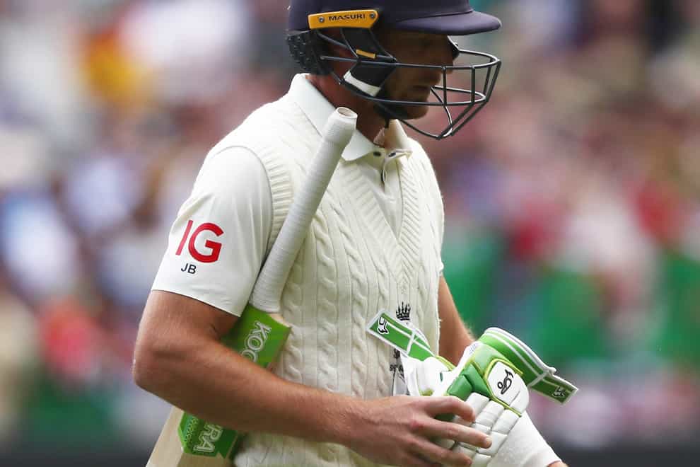 England’s Jos Buttler walks off after being dismissed during day one of the third Ashes test at the Melbourne Cricket Ground, Melbourne (Jason O’Brien/PA)
