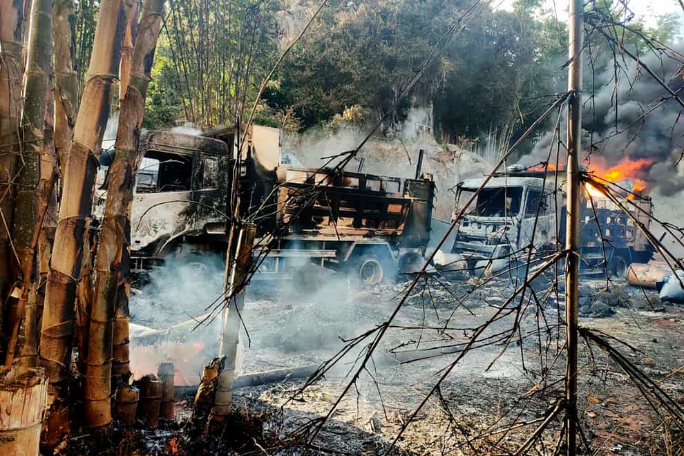 Smoke and flames billow from vehicles in Hpruso township, Kayah state, Myanmar, on Friday (Karenni Nationalities Defense Force via AP)