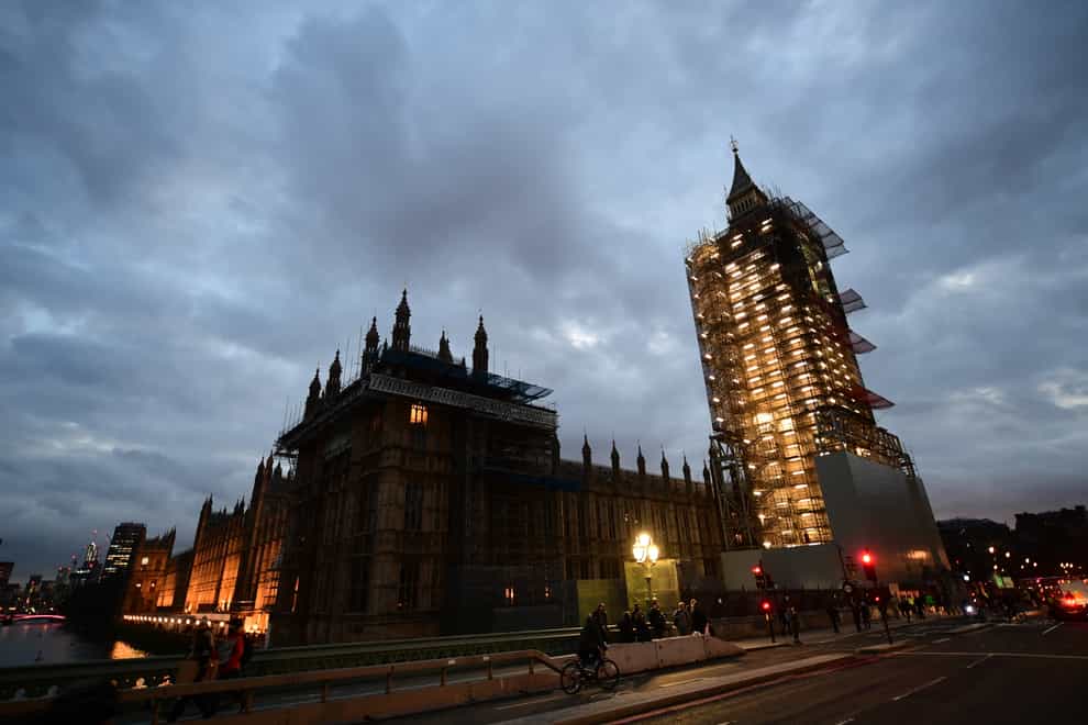 The Palace of Westminster covered in scaffolding as viewed from Westminster Bridge, central London (Ian West/PA)