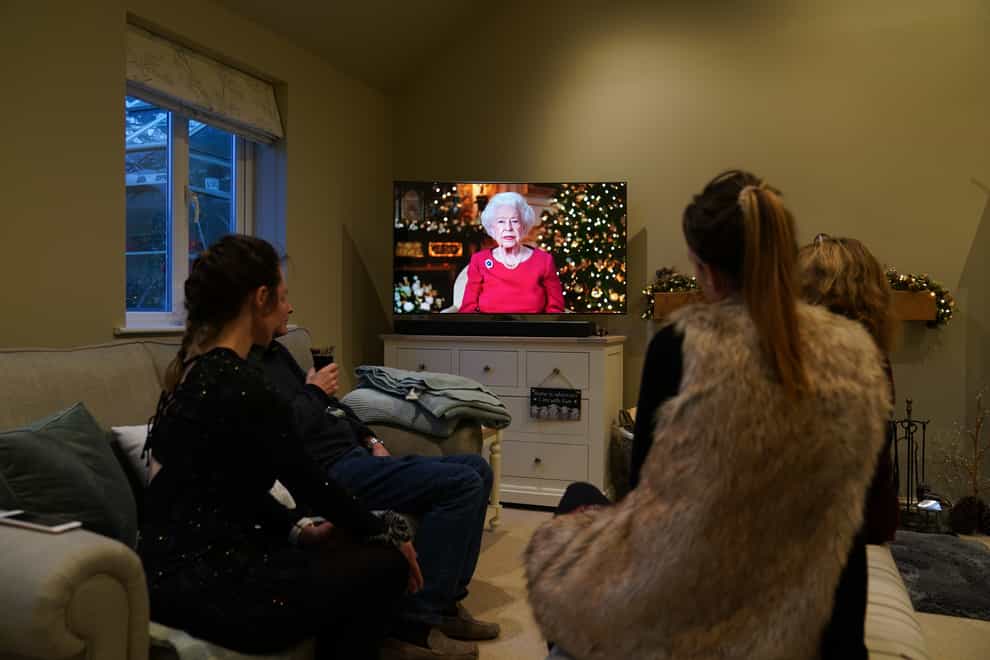 A family at home in Leicester watching the Queen give her annual Christmas broadcast (Joe Giddens/PA)