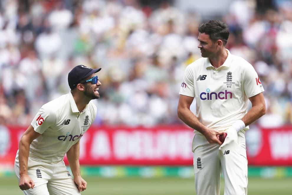 James Anderson, right, led the way as England’s bowlers brushed off the chaos of a Covid scare to give England a foothold on day two of the Boxing Day Ashes Test (Jason O’Brien/PA)
