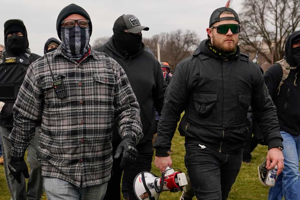 Proud Boys members Joseph Biggs, left, and Ethan Nordean were leading figures among the mob that stormed the Capitol building (AP Photo/Carolyn Kaster, File)