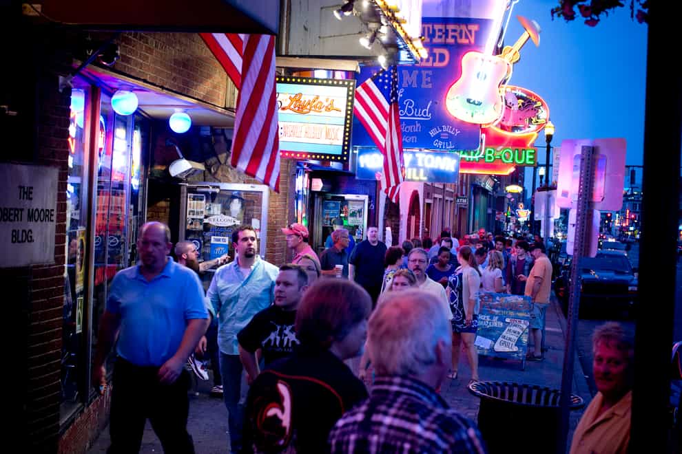 A scene from Broadway, the main strip through Nashville, outside of the famous Honky-Tonk bars (Credit Visit Music City).