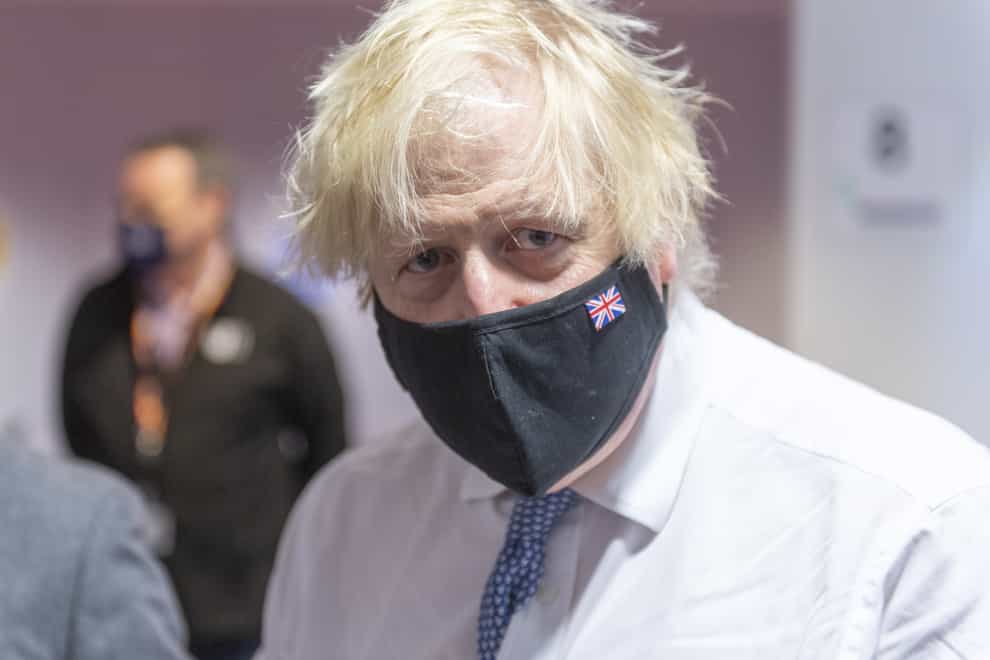Prime Minister Boris Johnson visits a Covid vaccination centre in Milton Keynes (Geoff Pugh/Daily Telegraph/PA)