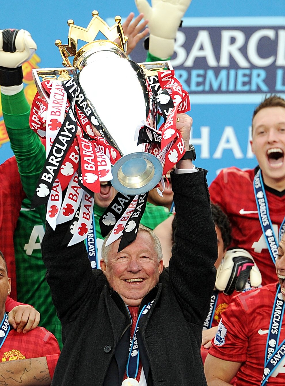 Sir Alex Ferguson lifts the Premier League trophy (Martin Rickett/PA)