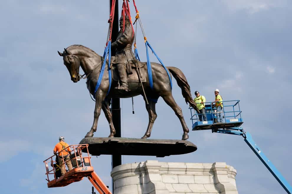 An enormous statue of General Robert E Lee is among the monuments to be given to Richmond’s black history museum (AP Photo/Steve Helber)