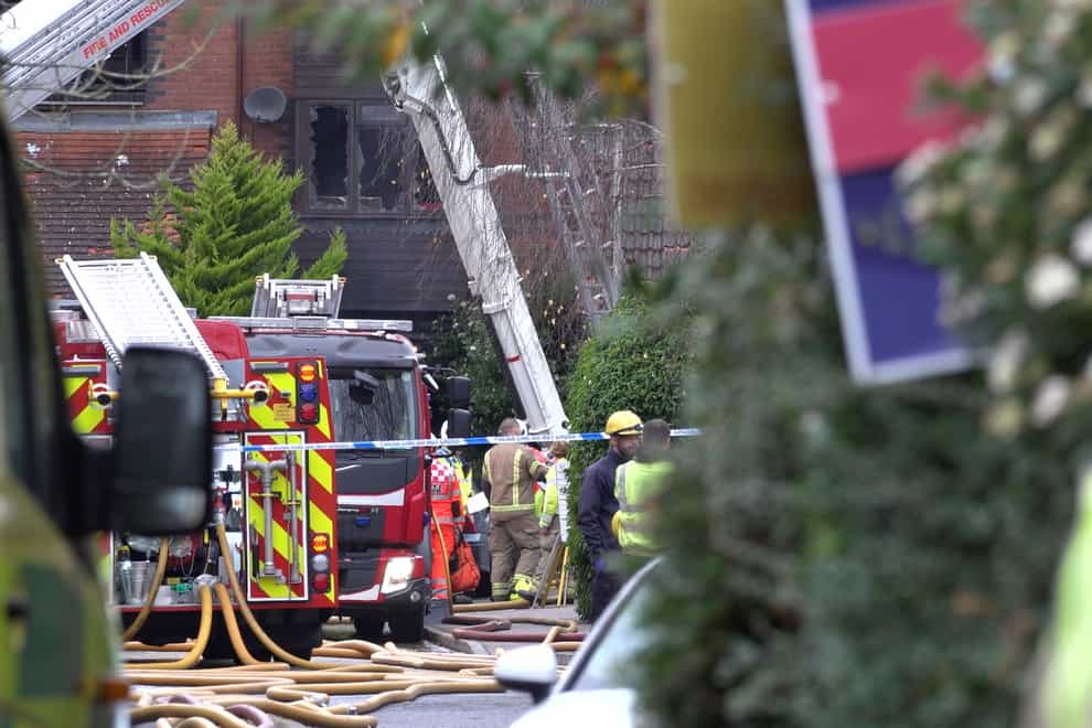 Firefighters at the scene of the blaze in Rowe Court, Reading (Marc Ward/PA)