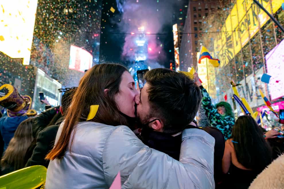 New York City welcomed the new year with confetti and cheers across Times Square as a New Year’s Eve tradition returned to a city beleaguered by a global pandemic (Craig Ruttle/AP)
