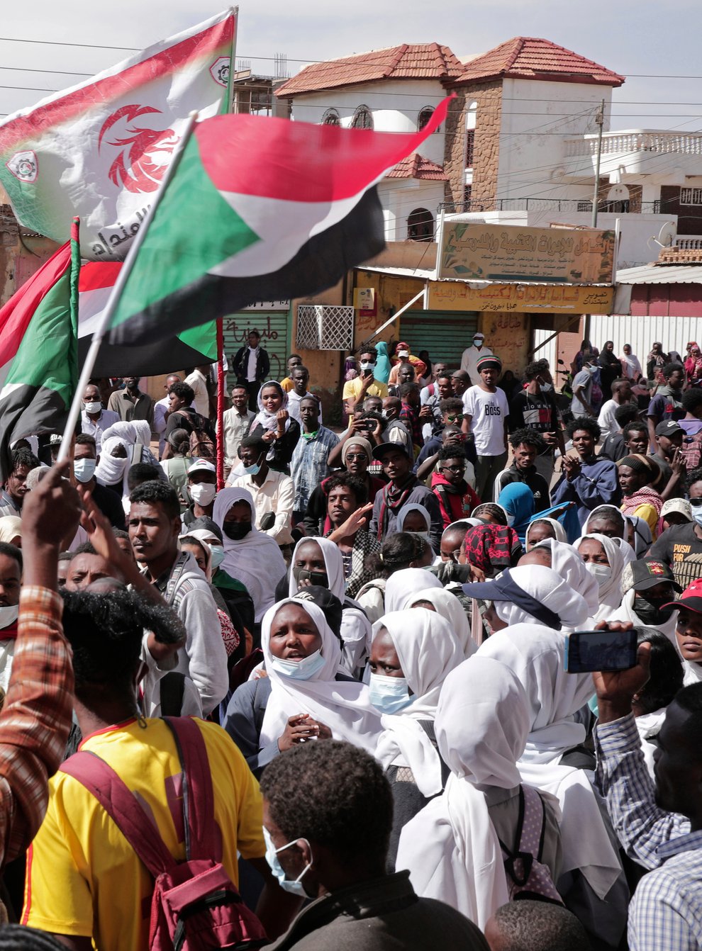 Sudanese security forces fired tear gas on Sunday to disperse protesters as thousands rallied against military rule (Marwan Ali/AP)