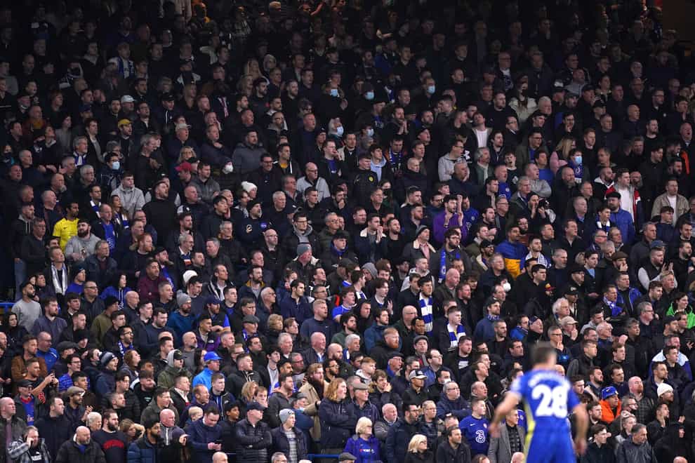 Fans in the safe-standing area watching the action at Stamford Bridge (Adam Davy/PA)