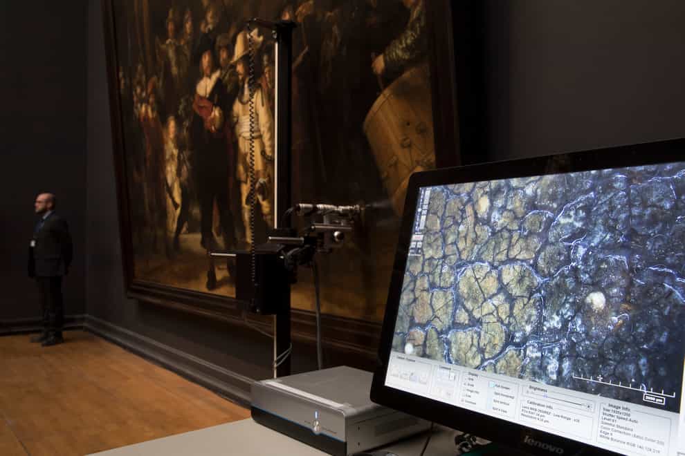 Rembrandt van Rijn’s painting The Night Watch is now also a supersized museum photo (Peter Dejong/AP)