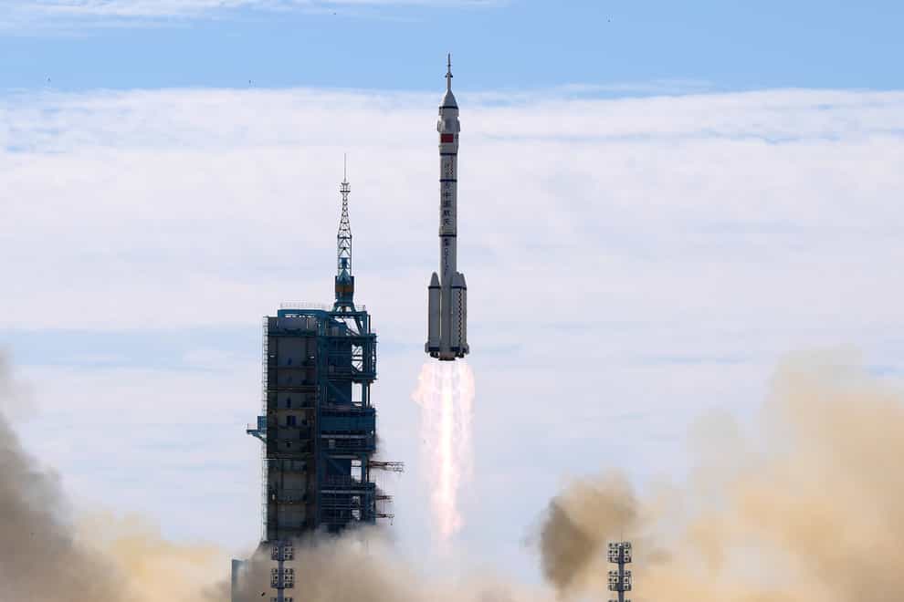 A rocket carrying a crew of Chinese astronauts (AP)