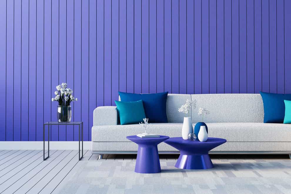 A living room wall in Very Peri, Pantone Colour of the Year 2022 (Alamy/PA)