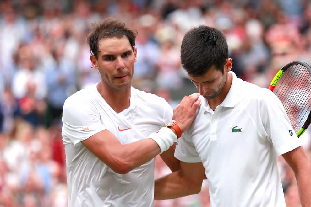 Rafael Nadal, left, has said his great rival Novak Djokovic would have no problem playing in Australia if he was vaccinated against Covid-19 (Andrew Couldridge/PA)
