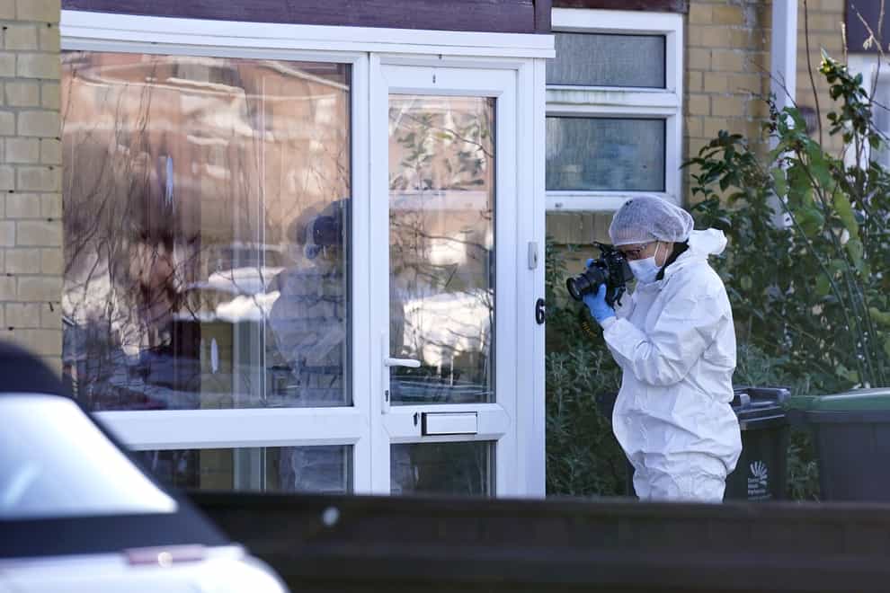 Forensics at the scene in Heath Road, Christchurch, Dorset, where police have launched a murder investigation following the discovery of the body of a man in his 30s on Tuesday evening. (Andrew Matthews/PA)