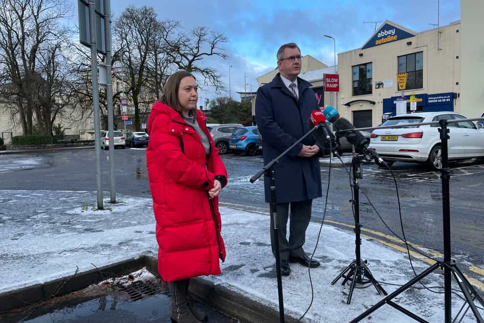DUP leader Sir Jeffrey Donaldson (right) speaks at media in Enniskillen, Co Fermanagh accompanied by local MLA Deborah Erskine (Jonathan McCambridge/PA)