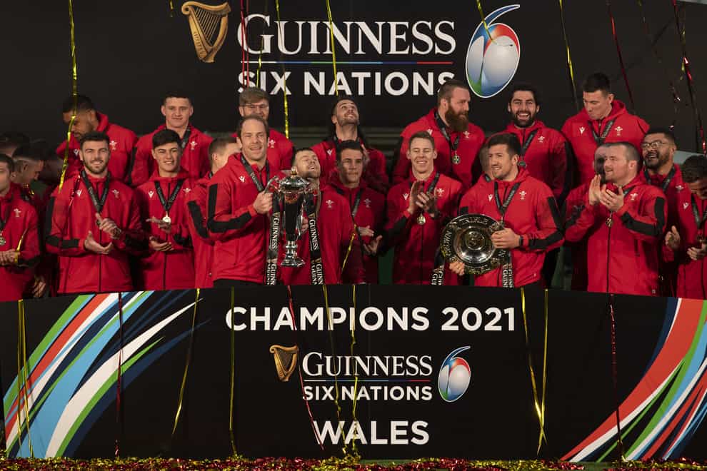 Handout photo provided by The WRU of Wales lift both the Triple Crown trophy and the Guinness Six Nations Trophy after being crowned Six Nations champions (Ben Evans/PA)