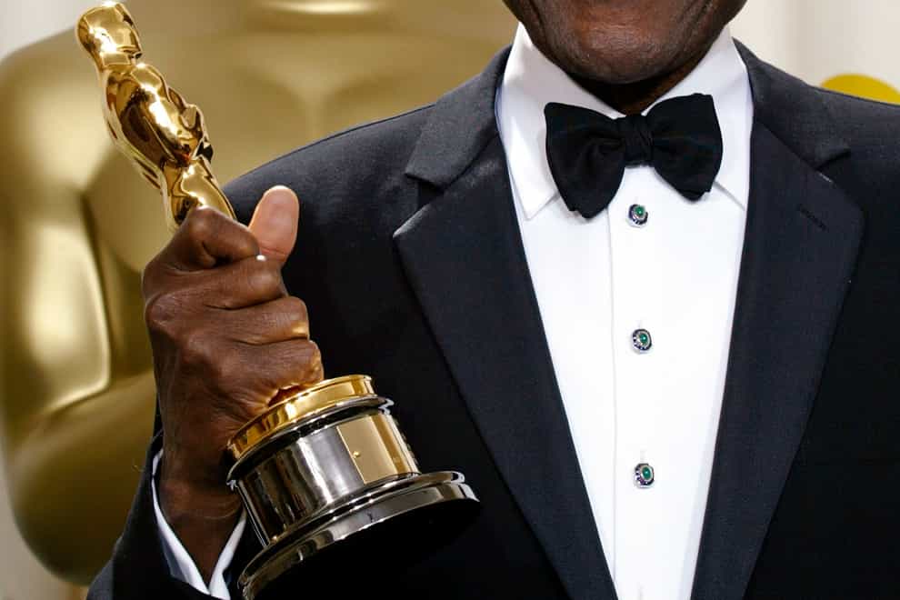 Sidney Poitier with his honorary Oscar during the 74th annual Academy Awards on March 24 2002 in Los Angeles (Doug Mills/AP)