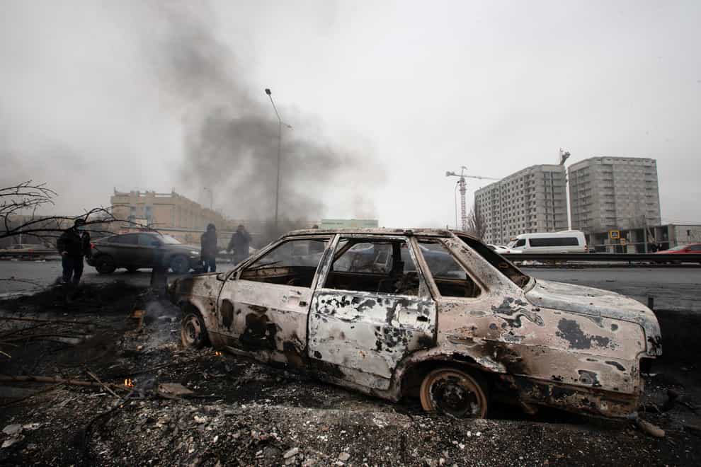A car which was burned after clashes in Almaty, Kazakhstan (Vasily Krestyaninov?AP)