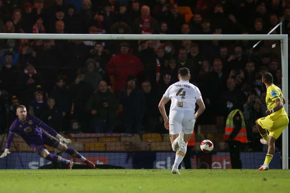 Bryan Mbeumo, right, completes his hat-trick from the penalty spot (Nigel French/PA)