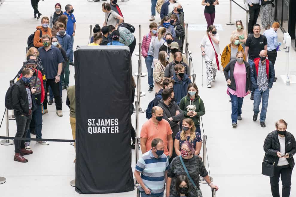 People queue for shops at the opening of the St James Quarter shopping centre in Edinburgh (PA)