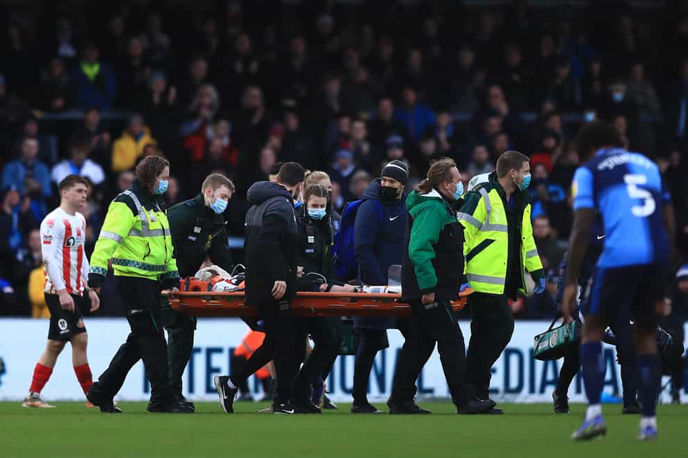 Sunderland’s Corry Evans is taken from the field on a stretcher after being injured during the Sky Bet League One match against Wycombe (Leila Coker/PA)