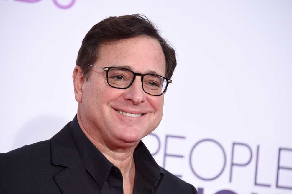 The cast of Full House said they will ‘grieve as a family’ following the death of Bob Saget (Jordan Strauss/AP)