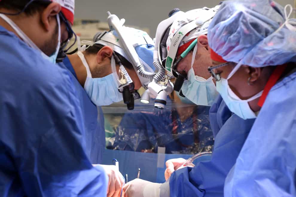 Surgeons at the University of Maryland School of Medicine perform a landmark pig heart transplant to a human (University of Maryland School of Medicine/PA)