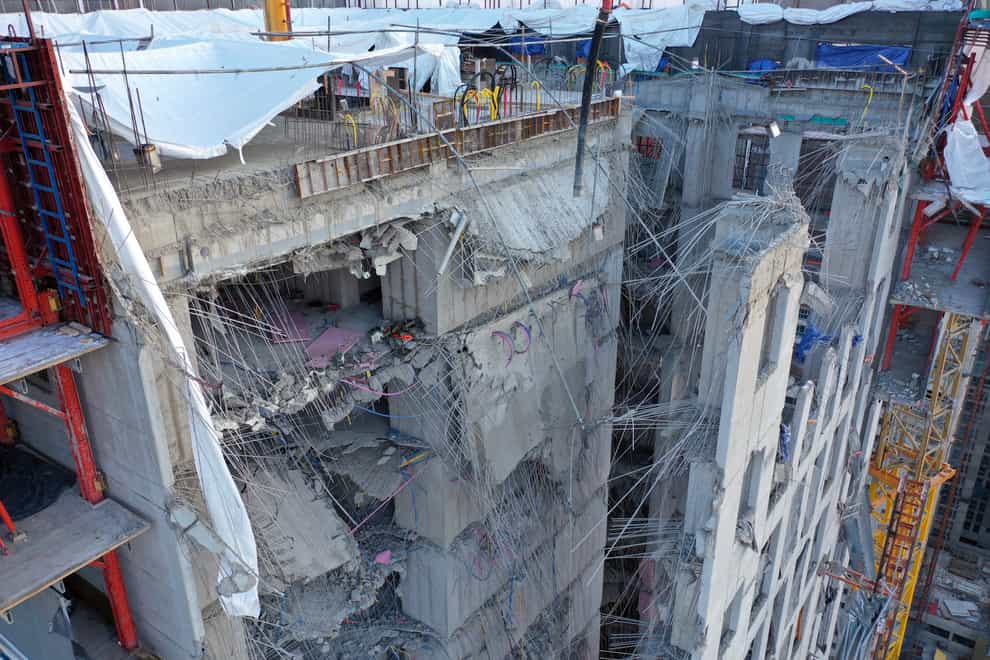 The collapsed exterior wall of an apartment block under construction at a site in Gwangju, South Korea (Jung Hee-sung/Yonhap/AP)
