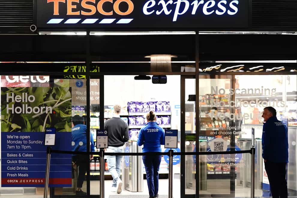 Supermarket giant Tesco has become the latest retailer to upgrade its annual outlook (Jonathan Brady/PA)