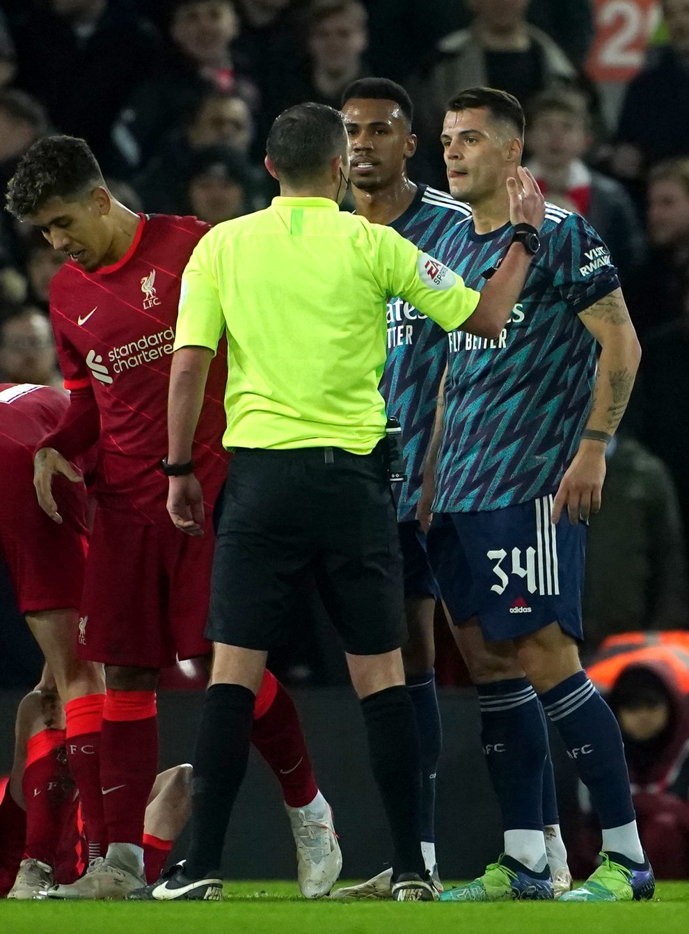 Granit Xhaka (right) was sent off at Anfield (Peter Byrne/PA)