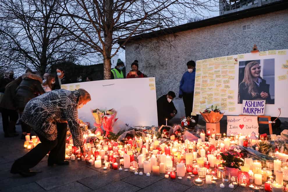 Local people light candles after a vigil in memory of Aisling Murphy (Damien Eagers/PA Wire)