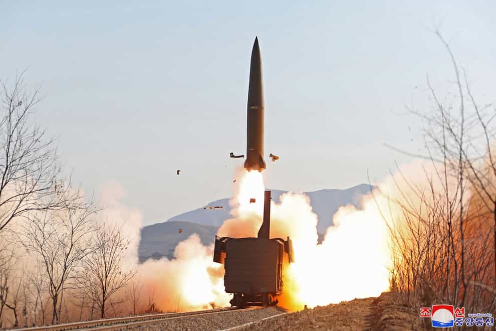 This photo provided by the North Korean government shows a missile test from railway in North Pyongan Province, North Korea, on January 14, 2022 (Korean Central News Agency/Korea News Service via AP)