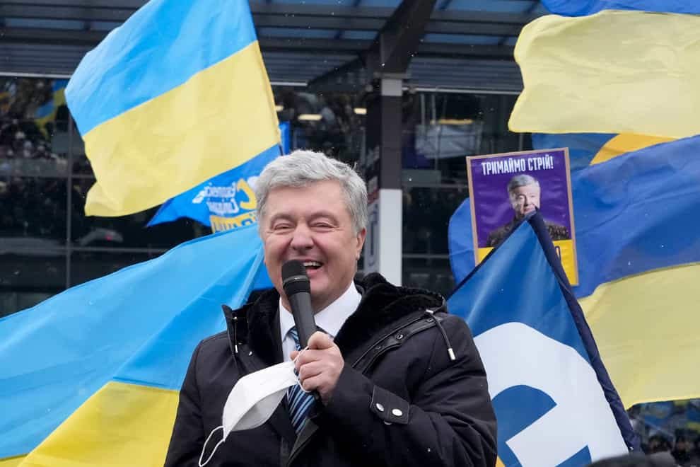 Former Ukrainian president Petro Poroshenko speaks to his supporters (AP)