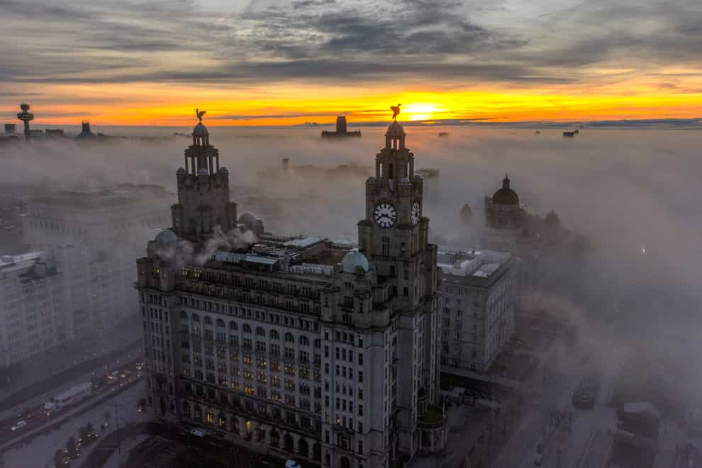 The Royal Liver Building surrounded by early morning fog in Liverpool (Peter Byrne/PA)