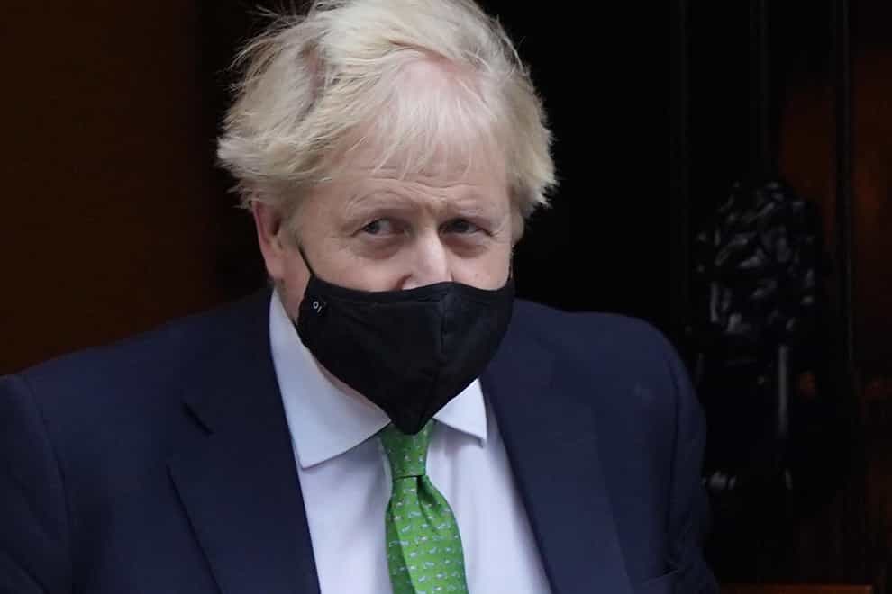 Prime Minister Boris Johnson leaves 10 Downing Street, London, to attend Prime Minister’s Questions at the Houses of Parliament. Picture date: Wednesday January 19, 2022.