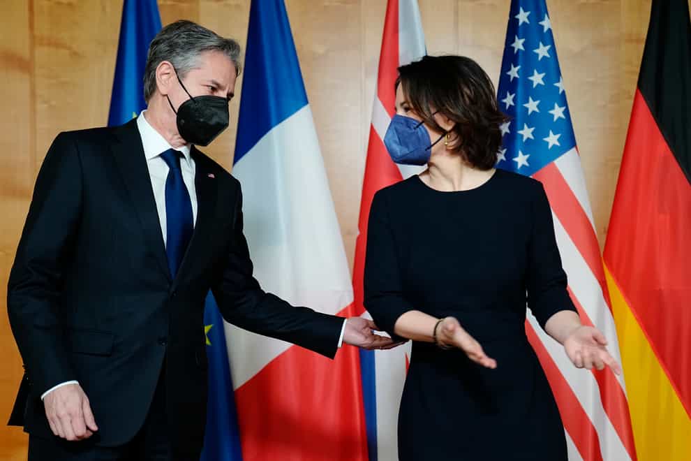 Antony Blinken is greeted by Annalena Baerbock, Germany’s foreign minister, ahead of talks on Ukraine (Kay Nietfeld/Pool via AP)