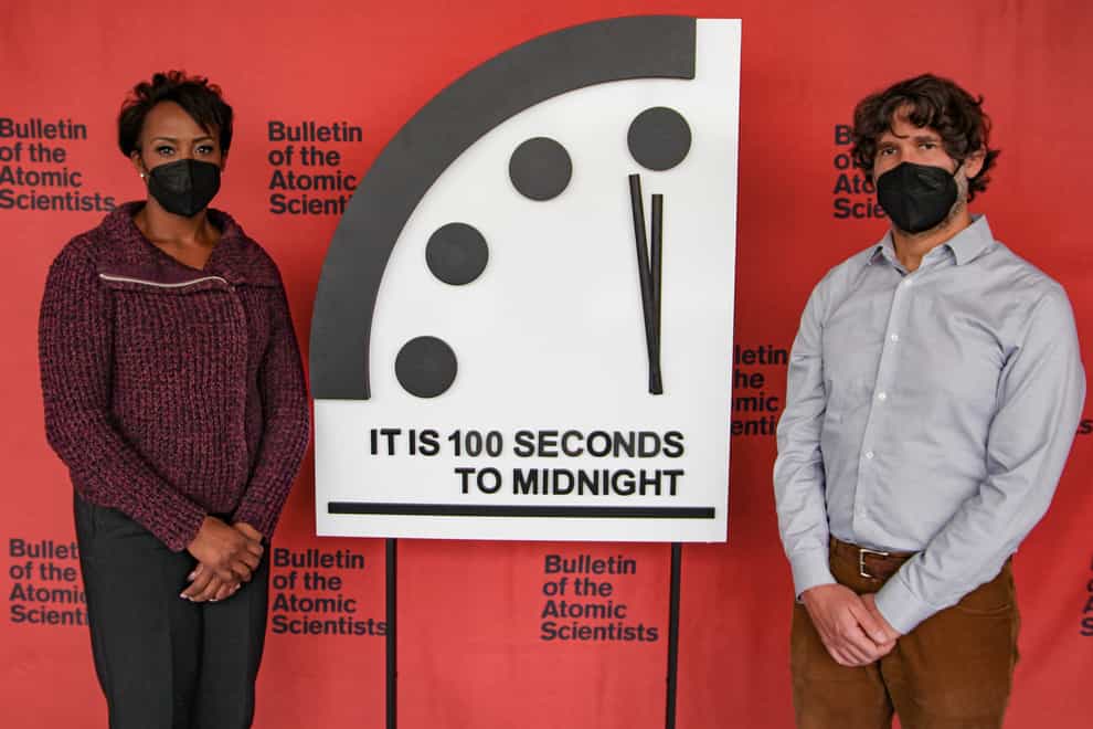 Dr Suzet McKinney and Dr Daniel Holz unveil the Doomsday Clock for 2022 (Bulletin of the Atomic Scientists/PA)