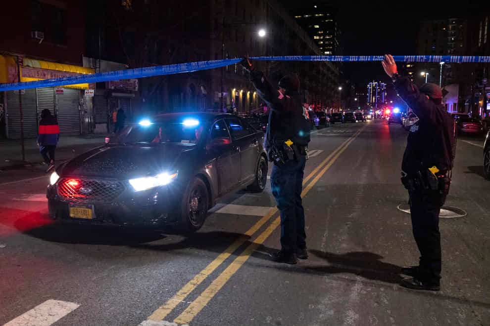 A New York Police Department (NYPD) officer has been killed and another gravely injured while responding to a domestic disturbance call (Yuki Iwamura/AP)