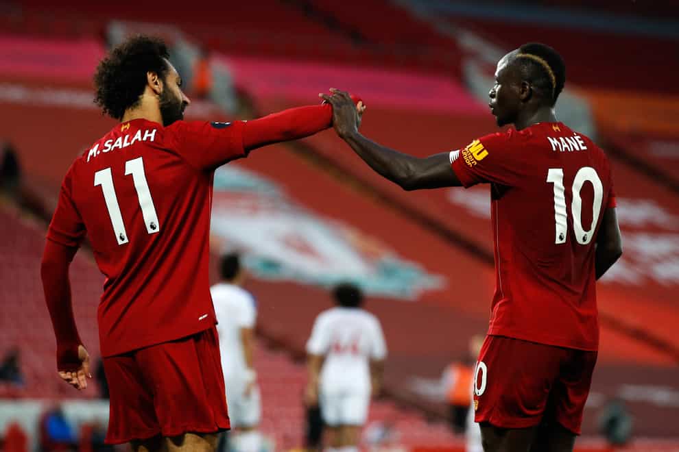 Sadio Mane and Mohamed Salah celebrate a goal for Liverpool against Crystal Palace (Phil Noble/NMC Pool/PA)